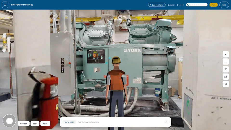 A student avatar at the control panel of a York reciprocating chiller in a scanned mechanical room